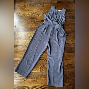Gorgeous  grey jumpsuit by Aster. Tie waist keyhole opening sexy and fun